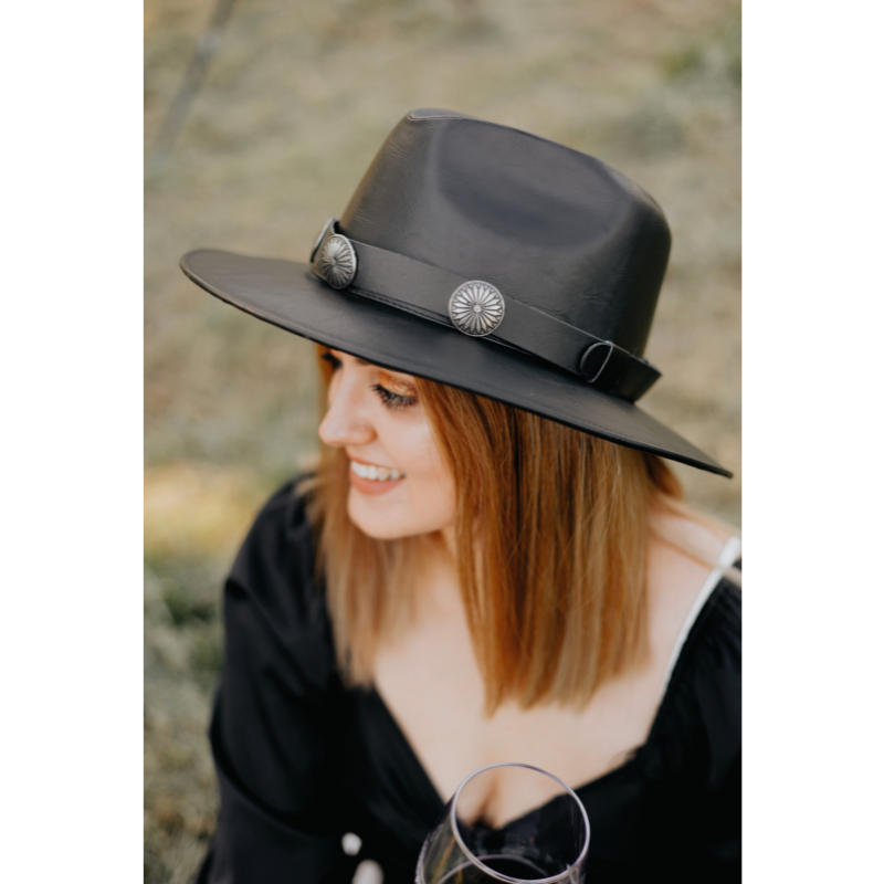 This hat is designed to suit both men and women and is crafted from premium quality faux leather, ensuring durability and longevity. The sleek and sophisticated design of the Tequila Hat is sure to make you stand out from the crowd.